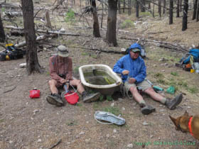 Brian and Jerry filtering water at Bathtub Spring in the Huachuca Mountains.