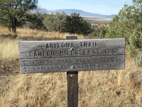 Weathered Arizona Trail trailhead sign for Canelo Hills East