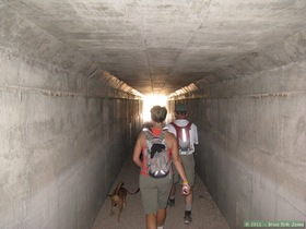 Jerry and Andrea in the tunnel going under I-10 on Passage 7 of the Arizona Trail