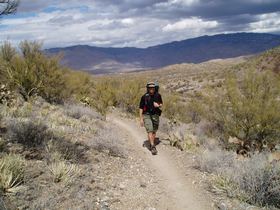 Brian nearing La Selvilla campground at Colossal Cave while hiking the Arizona Trail, Passage 8