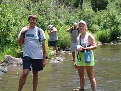 Brad and Lori soak up the cool waters of the Black River.