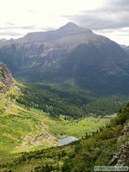 Jerry looking down on the companion lake to Buffalo Woman Lake with Mt. Phillips in the background.