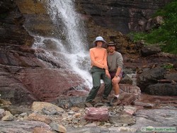 Shannon and I posing by the large waterfall at Beaver Woman Lake.