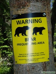 The warning sign about grizzlies in the area.