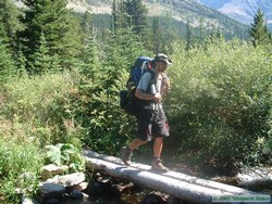 Here I am crossing a stream while hoofing it back to the car.