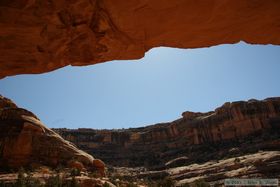 Pictographs in a seemingly impossible location way out at the edge of a large overhang roughly 70 feet above the ground.