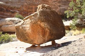 I thought this huge boulder supported by 3 small pillars of rock in Grand Gulch was fascinating.