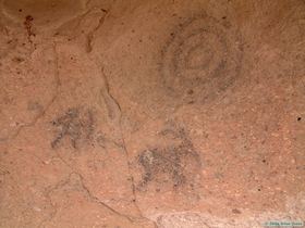 I'm not sure if they are authentic or not, but I found these pictographs near the window at the base of the spire near camp.