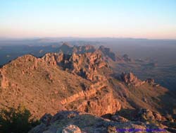 The mountains soften in the waning light, looking south into Mexico from the top of Mt. Ajo