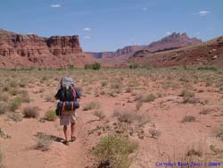 Jeff hikes along an overland route below Wilson Ranch.