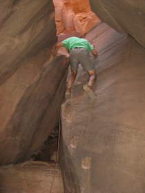 Steve descending the Boulder Choke in Buckskin Gulch.