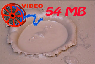 Video of a mud crater filling up with water.