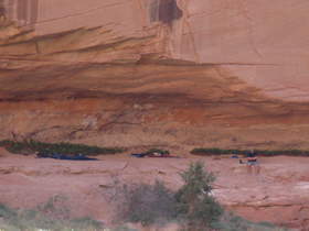 Chuck keeping an eye on the Great Basin Rattlesnake from our alcove camp in Paria Canyon.