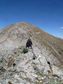 Brian on the ascent up towards South Truchas Peak with North Truchas Peak in the background.