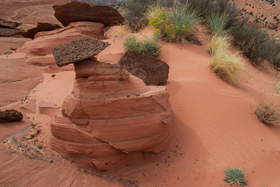 A large agglomeration of iron nodules on top of a small sandstone spire near Upper Buckskin Gulch.