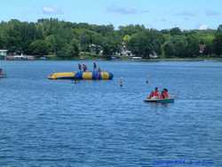 The family plays in Lake Koronis.