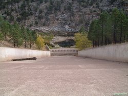 Looking down the very steep spillway behind the earthen dam that creates Chevelon Lake.