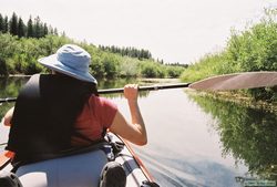 Shan paddling along the Clearwater River.