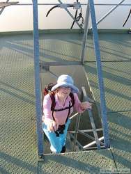 Shan cresting the long stairway up the 50 meter tower.