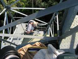 Chuck climbing down the 50 meter tower for the last time.