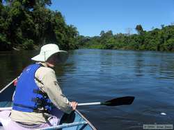Shannon kayak-canoeing down Rio Cristalino.