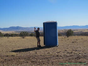 Jerry:  'What a convenient place for a bathroom in the middle of nowhere!'