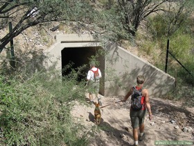 Jerry and Andrea entering the tunnel going under I-10 on Passage 7 of the Arizona Trail