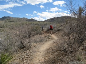 Andrea and Jerry nearing La Selvilla campground at Colossal Cave while hiking the Arizona Trail, Passage 8