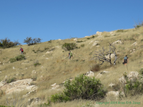 The crew hikes the rolling hills at the beginning of Passage 10.