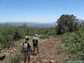 Andrea and Jerry hiking AZT Passage 26 on Hardscrabble Mesa.