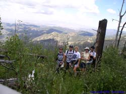 Janet, Brad, Lori, Shannon, Brian and Pepper (hiding in the grass) on the trail to Chiricahua Peak.