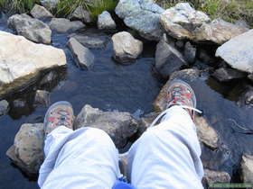 Filtering water at a stream flowing in to Pecos Baldy Lake in the Sangre de Cristo Mountains.