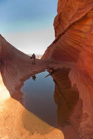 Chuck photographing a tinaja near the Wave in Coyote Buttes North.
