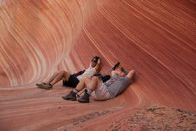 Steve and Chuck lounging near The Wave in Coyote Buttes North.