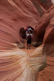 Steve and Chuck exploring a sculpted sandstone wash in Coyote Buttes North.