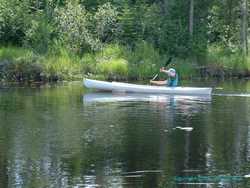Shan paddles the kayak around solo.