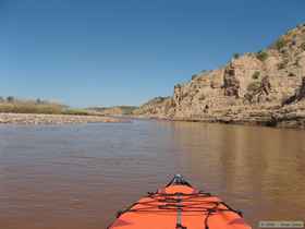 Safely through the mighty rapids and floating past cliffs on the dying breath of the Salt River.